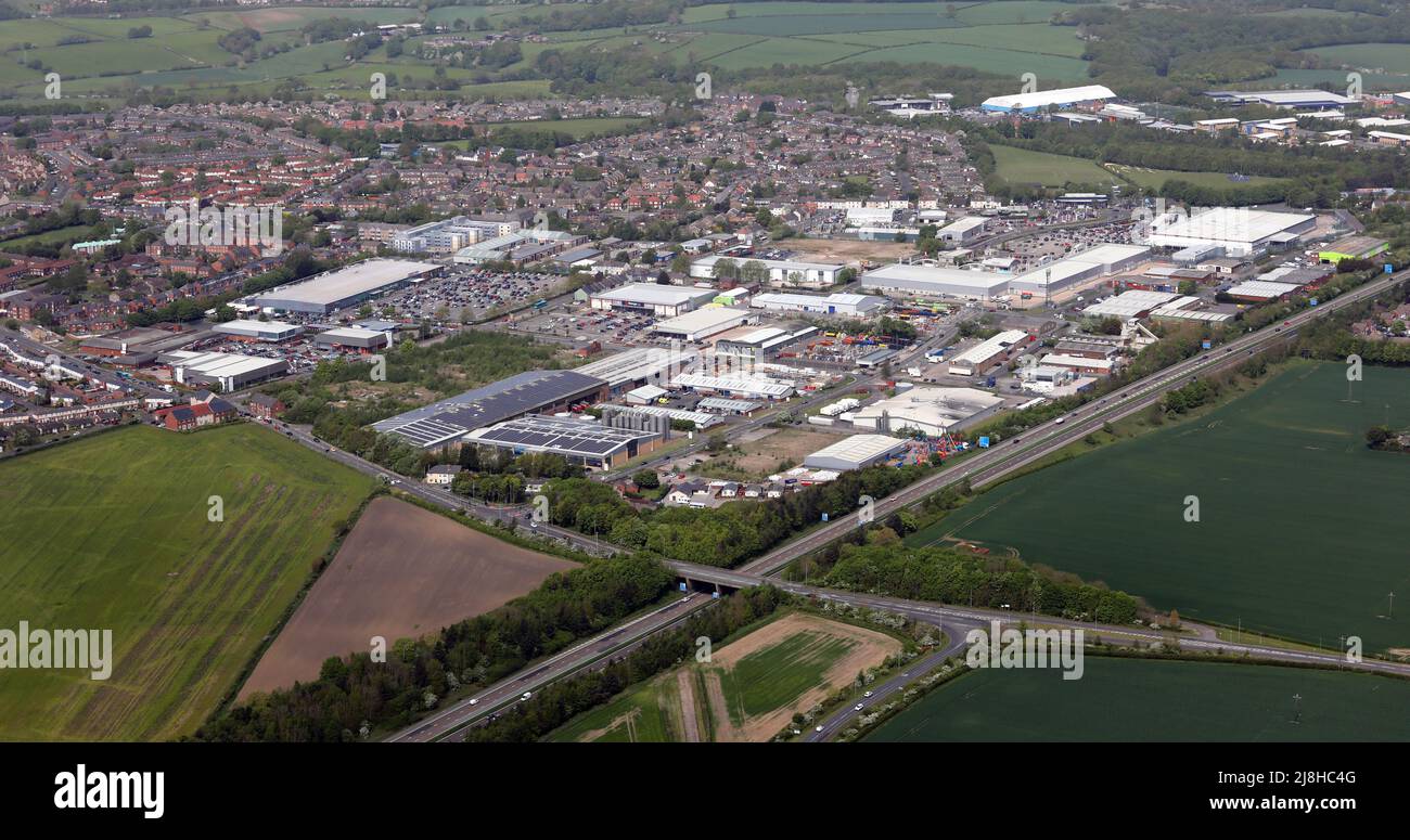 aerial view from the south east of Dragon Ville Industrial Estate with Durham City Retail Park beyond to the right, A1 in foreground Stock Photo