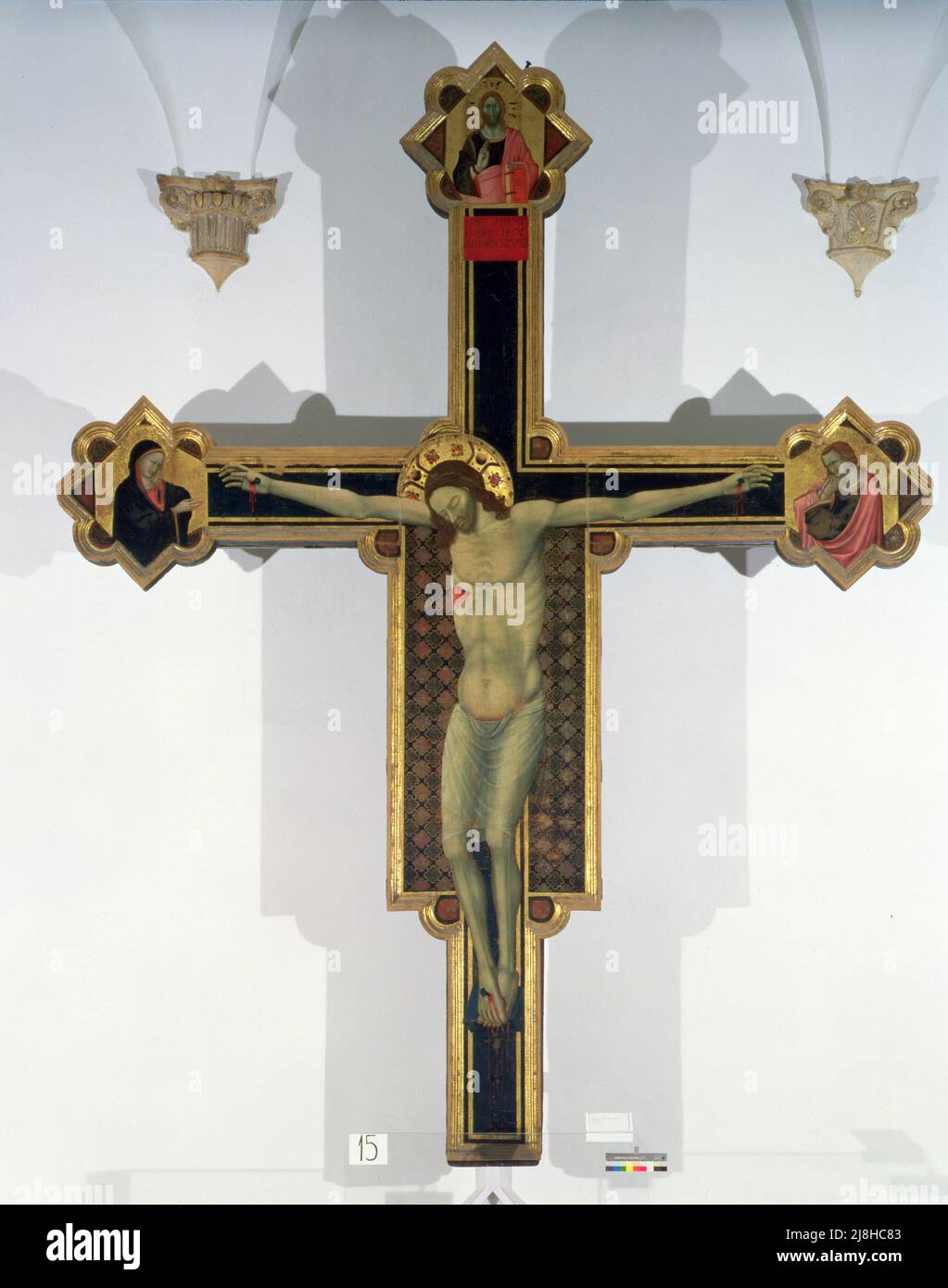 Crucifixion (tempera on panel) by Master of Verucchio, (14th century); Palazzo Ducale, Urbino, Italy; Italian,  out of copyright. Stock Photo