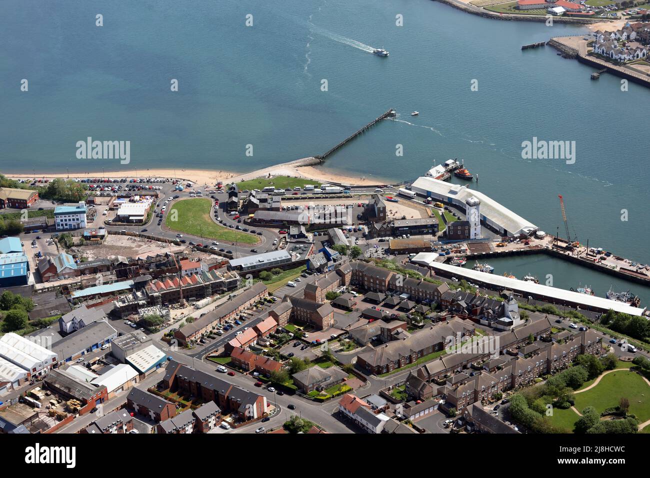 aerial view of North Shields Fish Quay port, The Old Low Light heritage museum, Fish Quay Sands and beaches Stock Photo