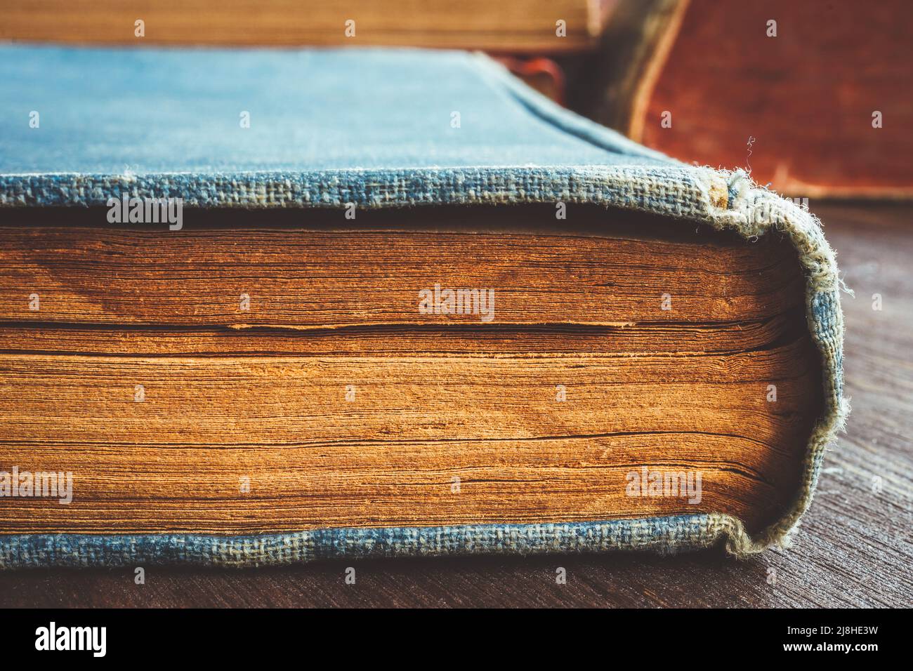 Close-up of an old book. Knowledge and wisdom. Stock Photo