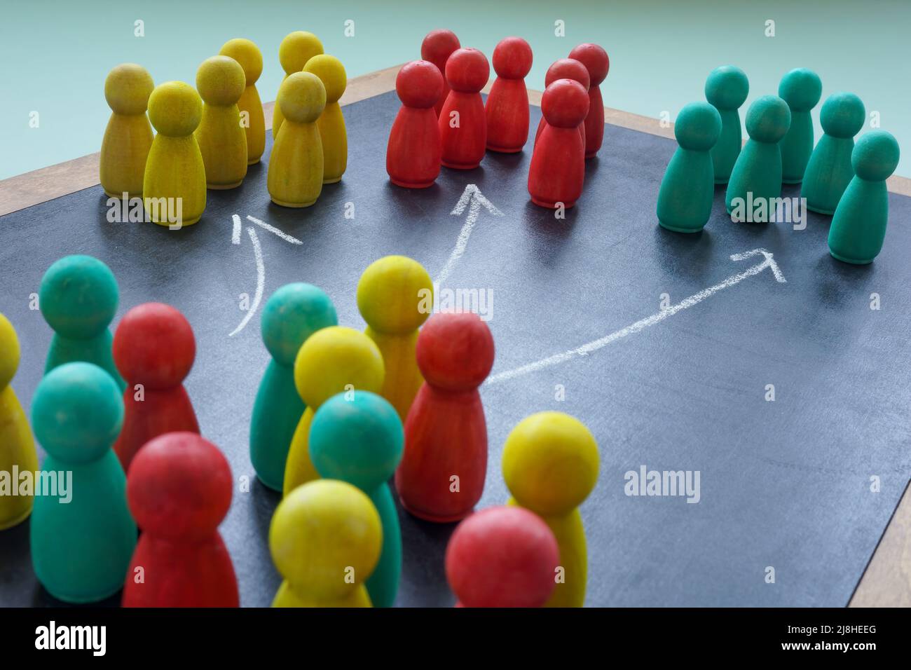 Colored figures and arrows as a symbol Market segmentation. Stock Photo