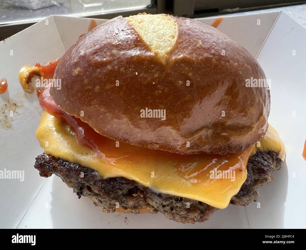 Smashed, blended burger with mushroom protein blended into meat, on a pretzel bun, San Francisco, California, March 17, 2022. Photo courtesy Sftm. Stock Photo