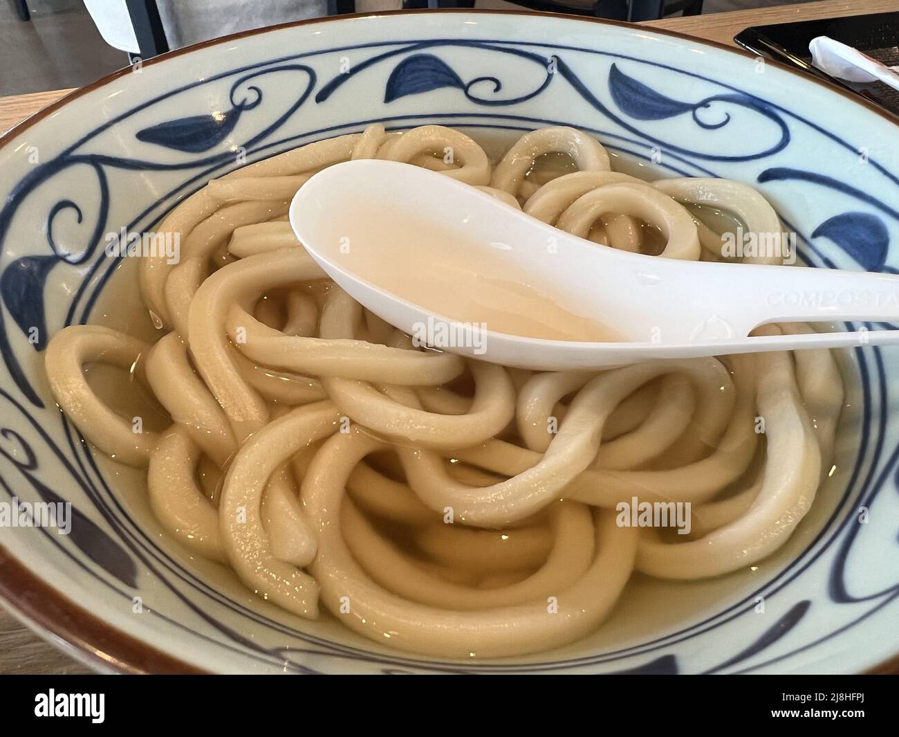 Closeup of plain udon soup at Marugame Udon restaurant in San Ramon