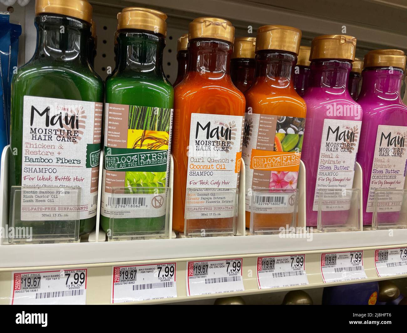 Grovetown, Ga USA - 04 15 22: Hair care products on Retail store shelves and price tags Stock Photo
