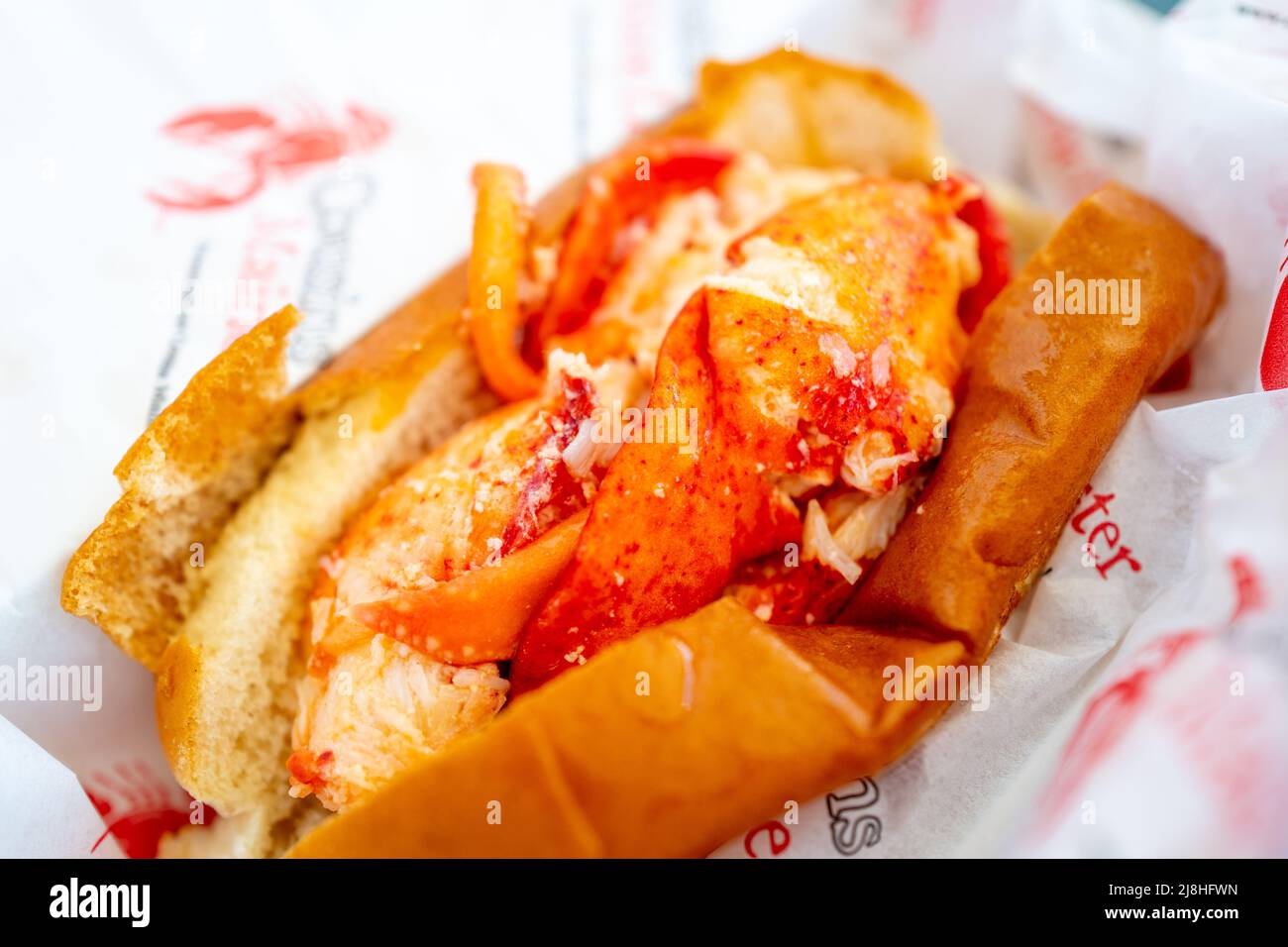 Closeup of a lobster roll from Cousins Maine Lobster food truck, San
