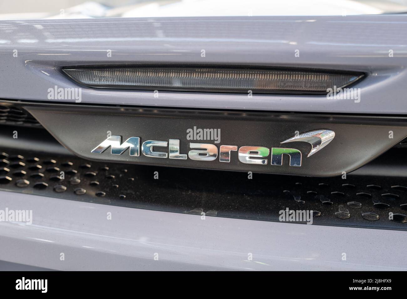 Close-up of logo for luxury carmaker McLaren on automobile, San Ramon, California, February 12, 2022. Photo courtesy Sftm. Stock Photo