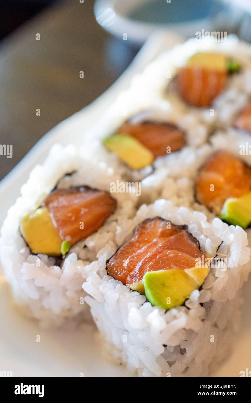 Close-up of salmon avocado sushi roll at Blue Gingko restaurant in Lafayette, California, February 28, 2022. Photo courtesy Sftm. Stock Photo