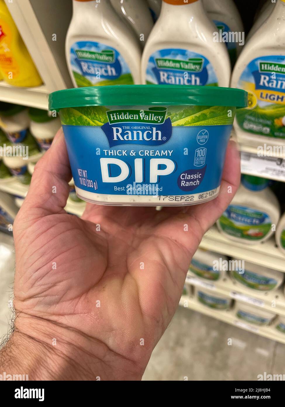 Grovetown, Ga USA - 12 15 21: Retail store Hidden Valley Ranch dressing hand holding dip cup Stock Photo