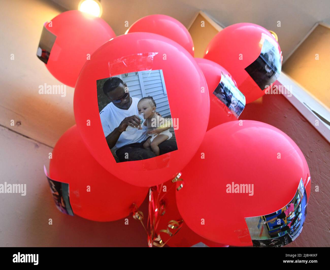 Racine, Wisconsin, USA. 15th May, 2022. Memorials, including balloons ...