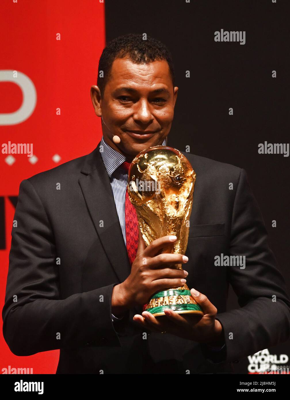 Kuwait City. 16th May, 2022. Brazilian former soccer player Gilberto Silva displays the World Cup trophy during a FIFA World Cup Trophy Tour event in Kuwait City, Kuwait, May 16, 2022. Credit: Xinhua/Alamy Live News Stock Photo