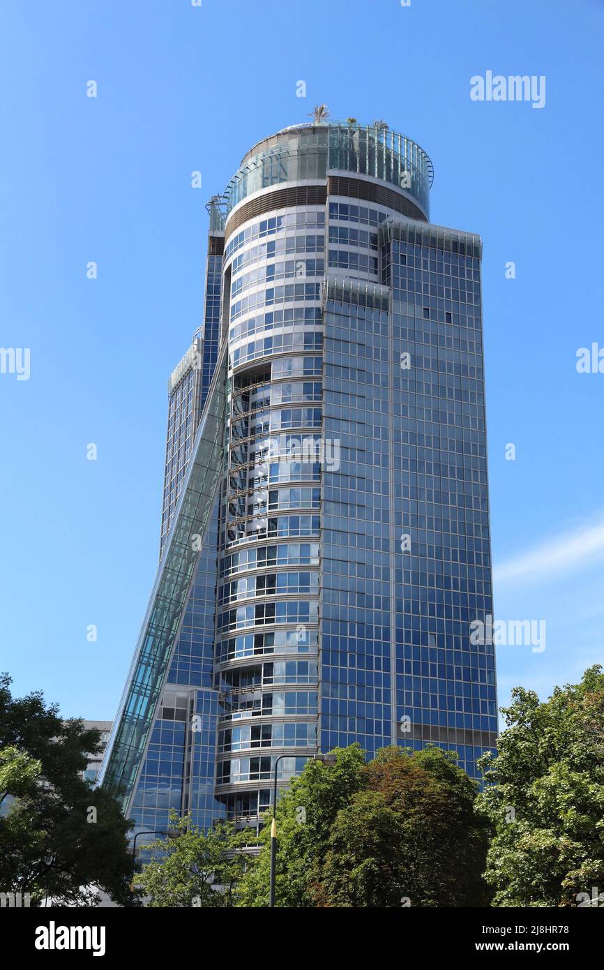 WARSAW, POLAND - JUNE 19, 2016: Spektrum office building in Poland. Tenants of the building include BGZ BNP, Finip Group and Westwing. Stock Photo