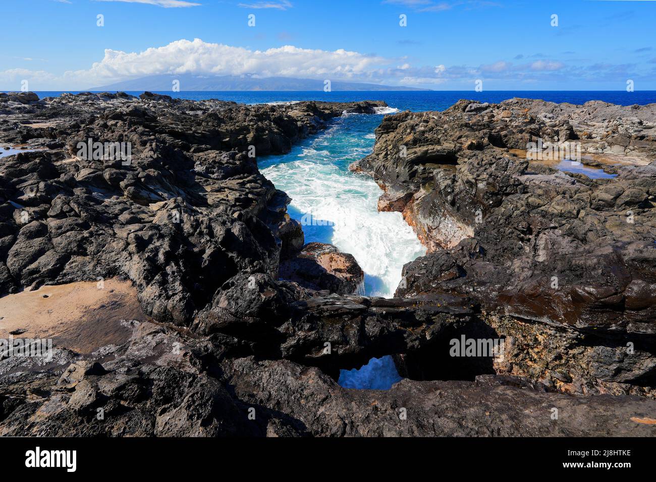 Rugged coastline at the tip of Makaluapuna Point in West Maui, Hawaii