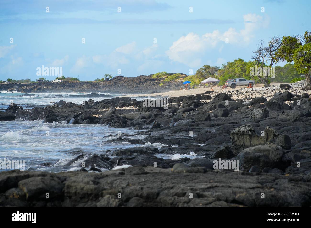 Solidified lava on the sandy O'oma Beach near KailuaKona in the west