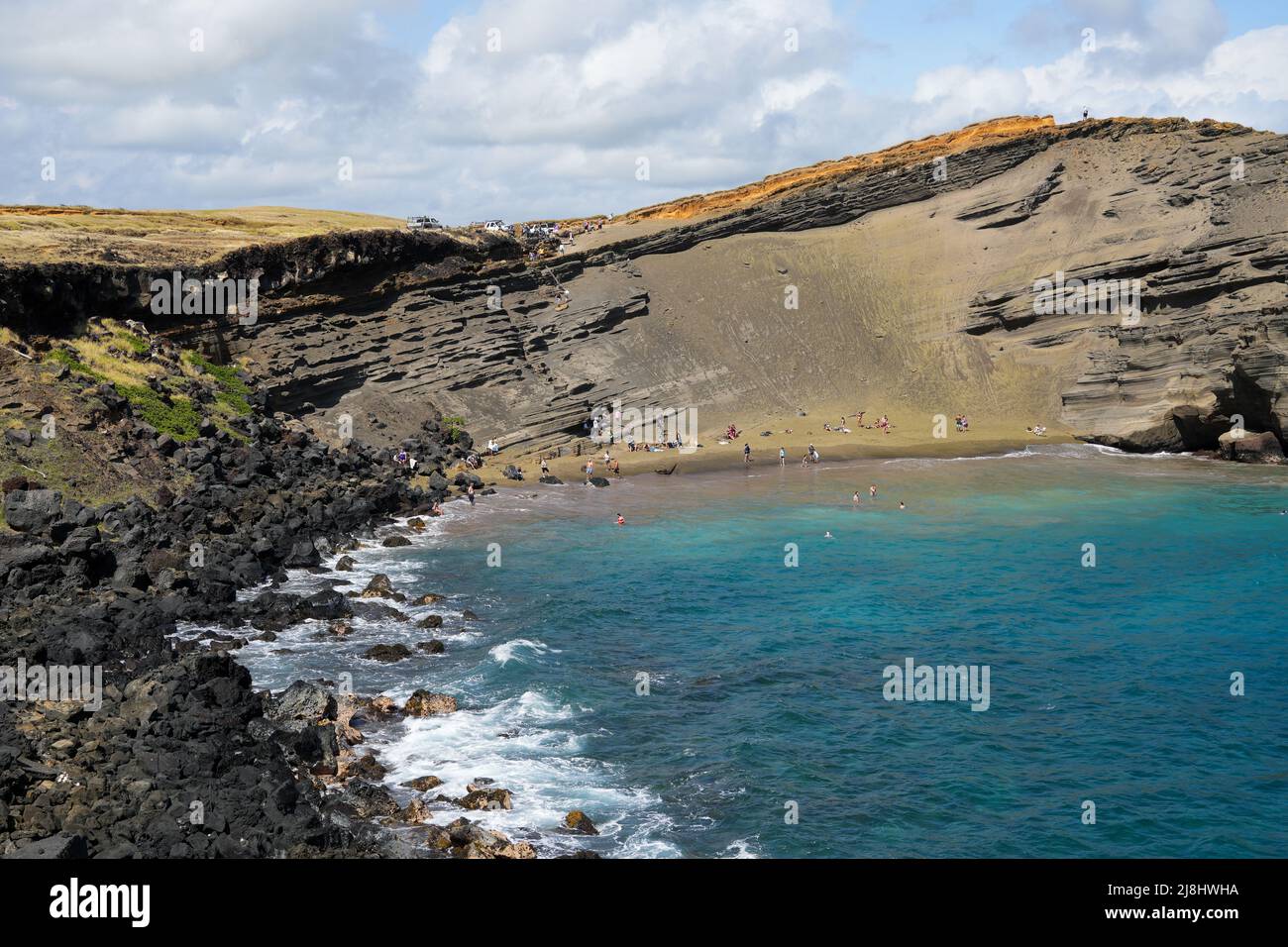 Papakolea Beach, one of only four green sand beaches in the world, near ...