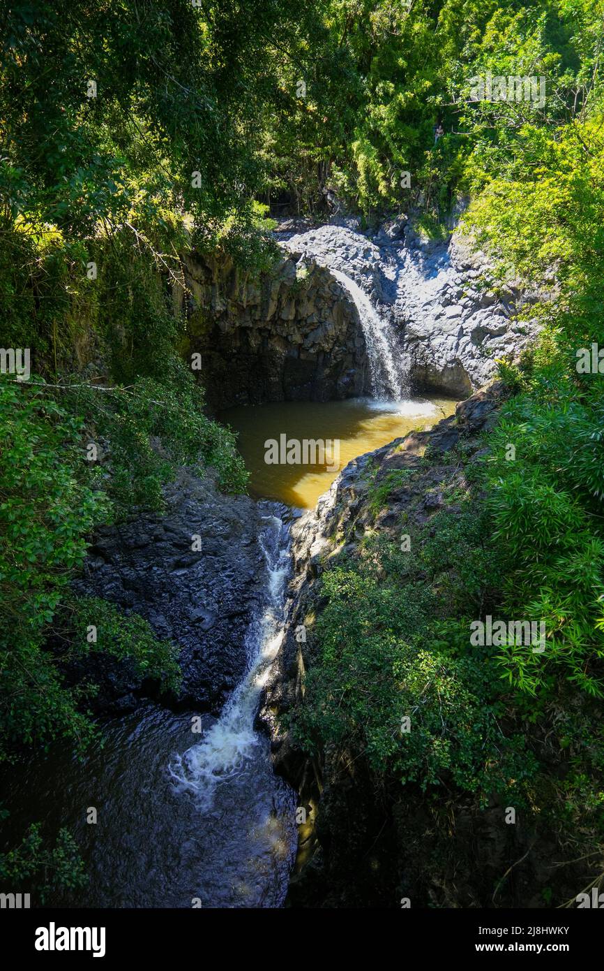 Double waterfall and muddy pools on the Pipiwai Trail in the Haleakala