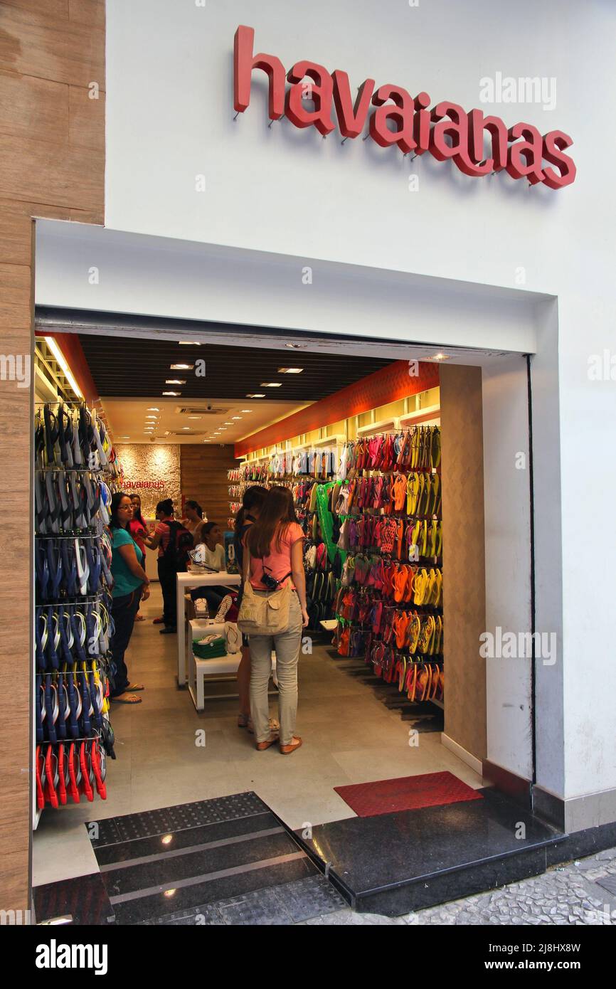 SAO PAULO, BRAZIL - OCTOBER 6, 2014: People visit Havaianas brand flip flop footwear store in Sao Paulo. Havaianas is one of most recognized flip flop Stock Photo