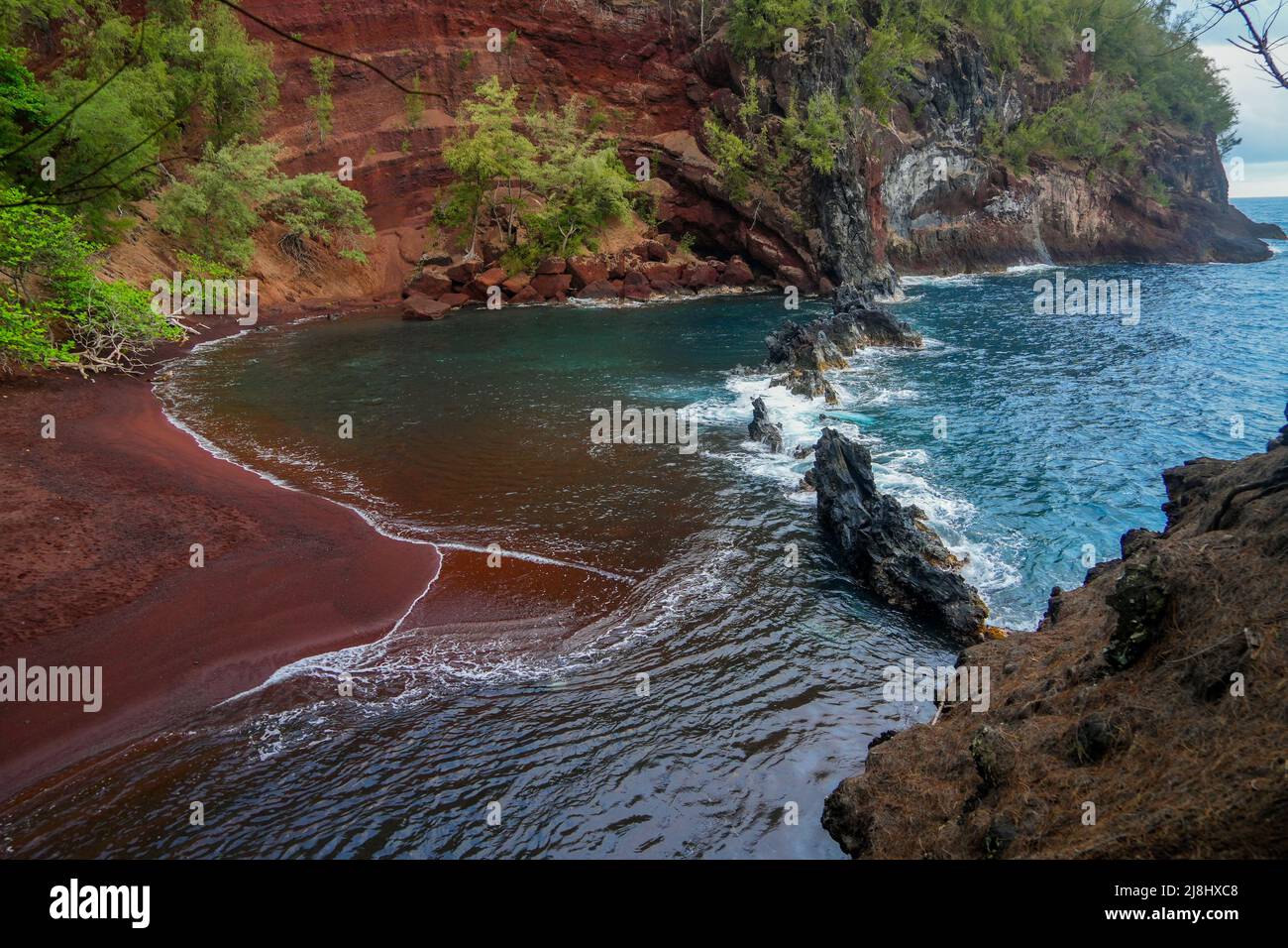 Kaihalulu Red Sand Beach on the Road to Hana in the East of Maui island in Hawaii, United States
