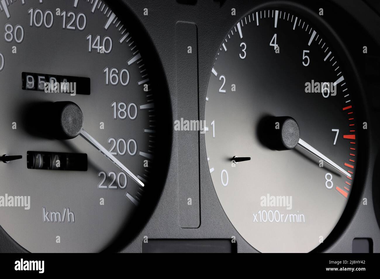tachometer and speedometer in car dashboard at full power Stock Photo Alamy