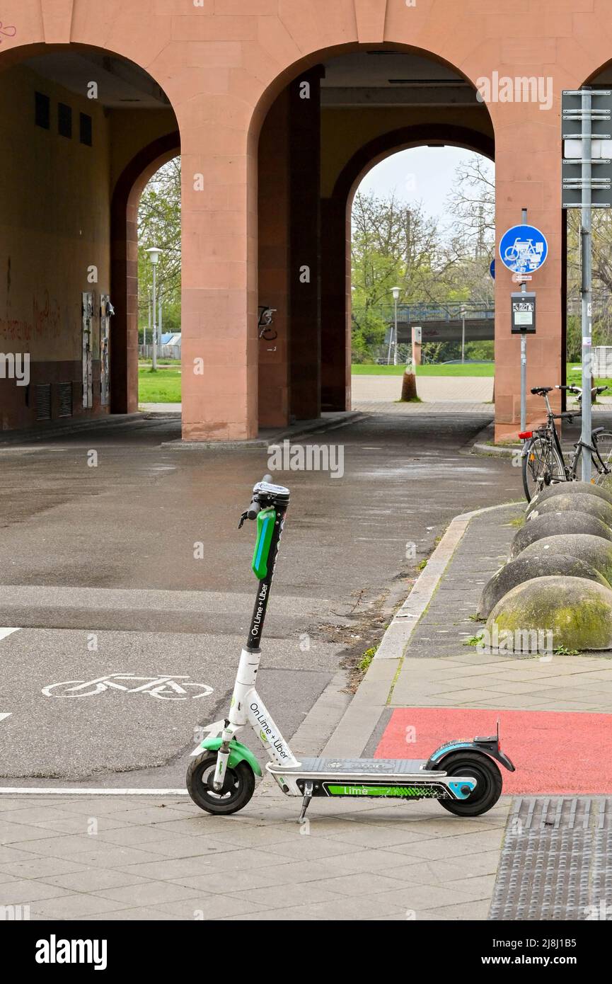 Mannheim, Germany - April 2022: Electric scooter left on the pavement on a  street near the city centre. The scooter is part of a rental sharing system  Stock Photo - Alamy