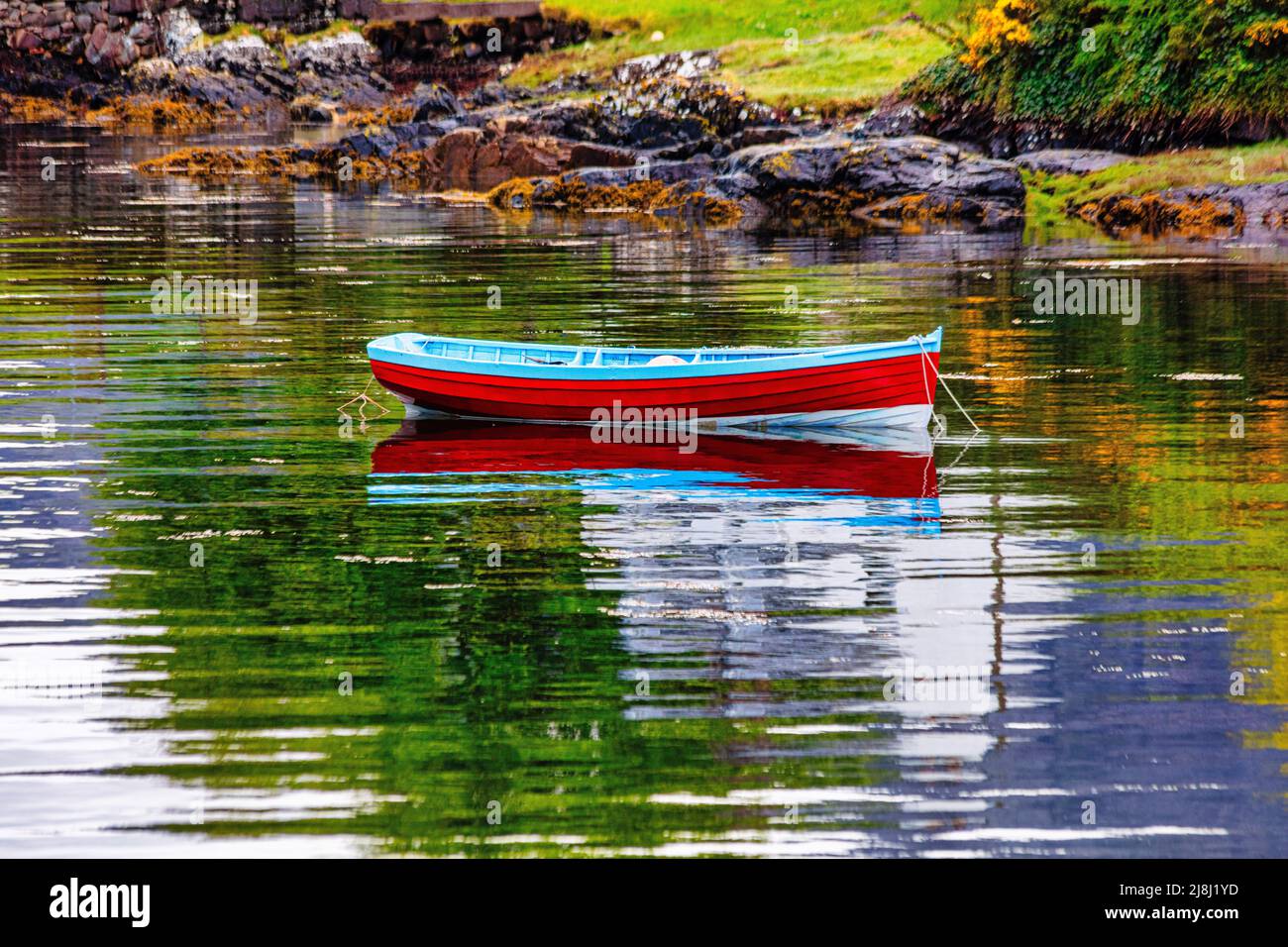 Fishing boat  on  Loch Carron with stunning views overlooking the picturesque  village of Plockton,The Jewel of the Highlands, Scotland Stock Photo