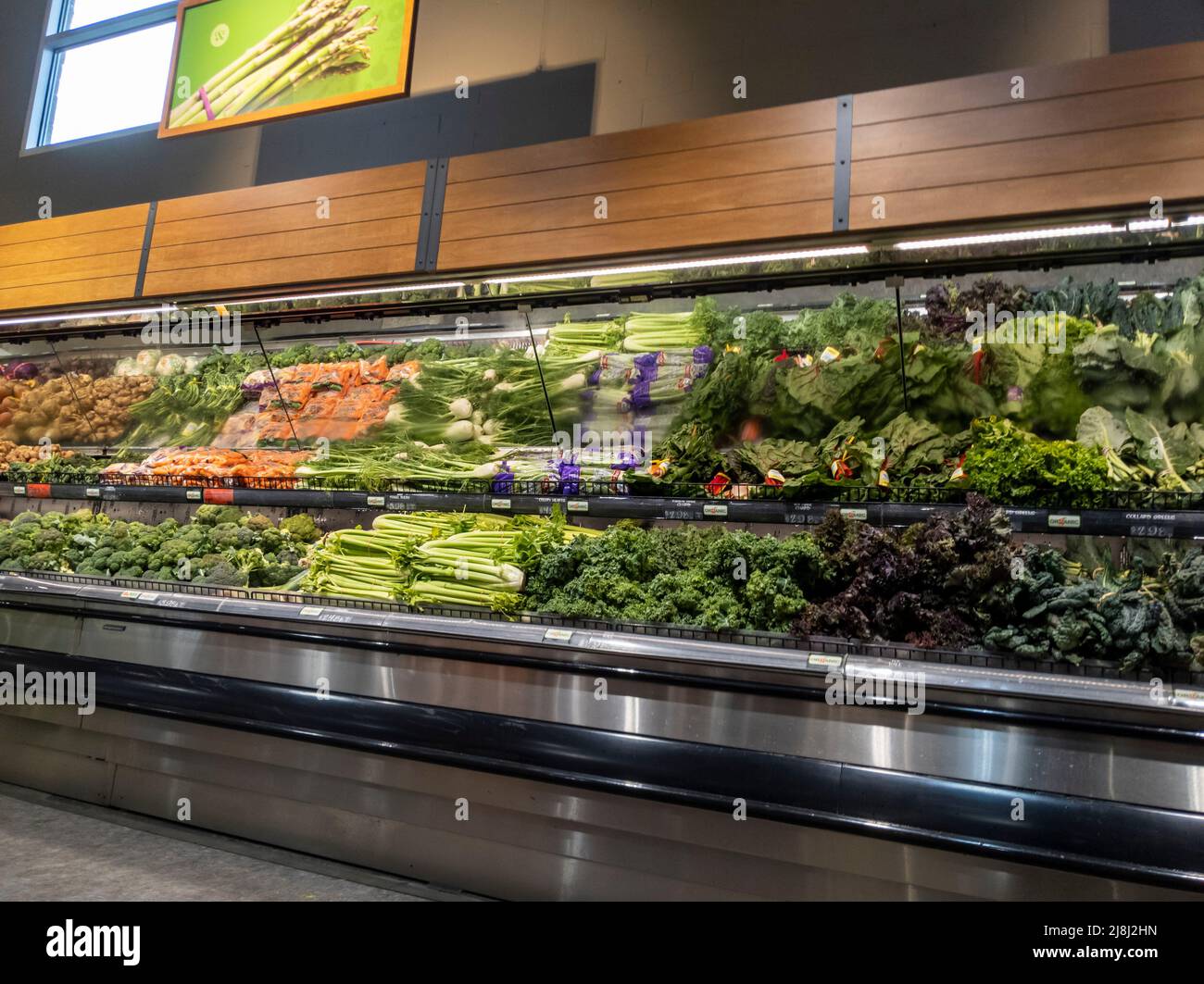 Fresh organic vegetable selection in produce aisle at grocery store  supermarket. Stock Photo