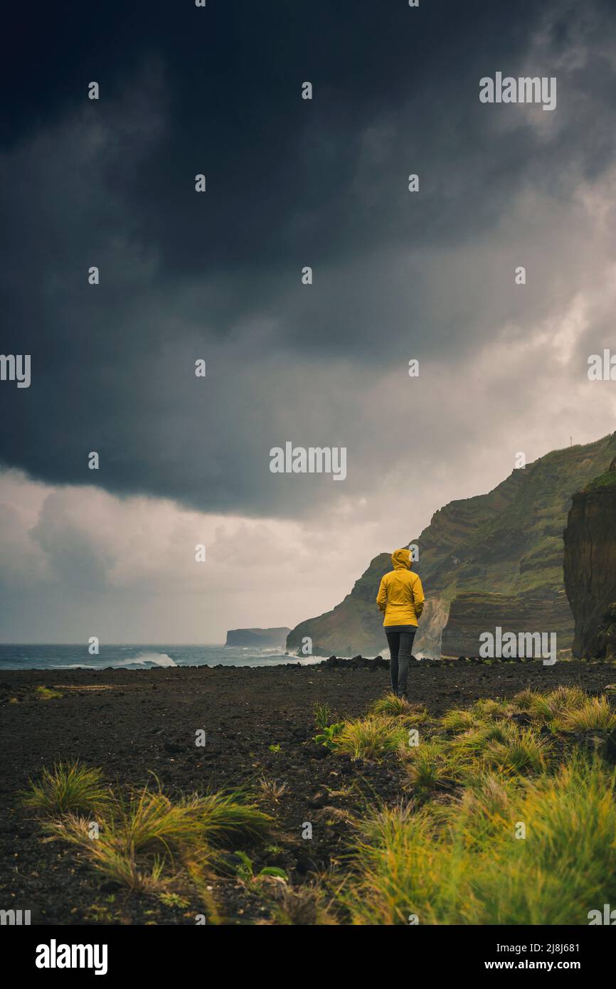 Woman alone exploring the nature in Azores Island, Portugal Stock Photo