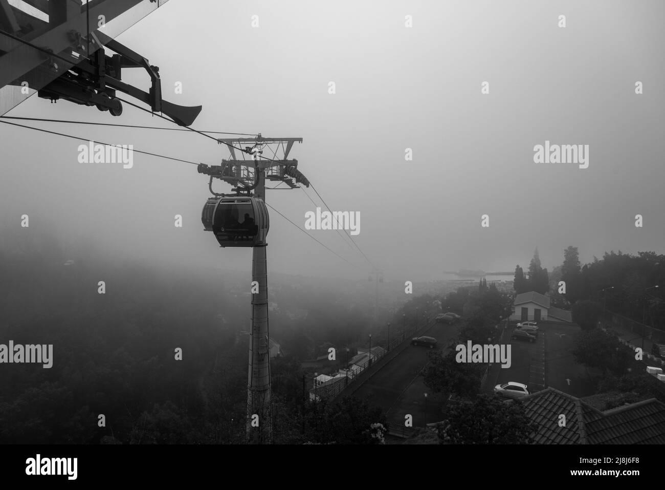 Misty cable car ride in Madeira Stock Photo Alamy