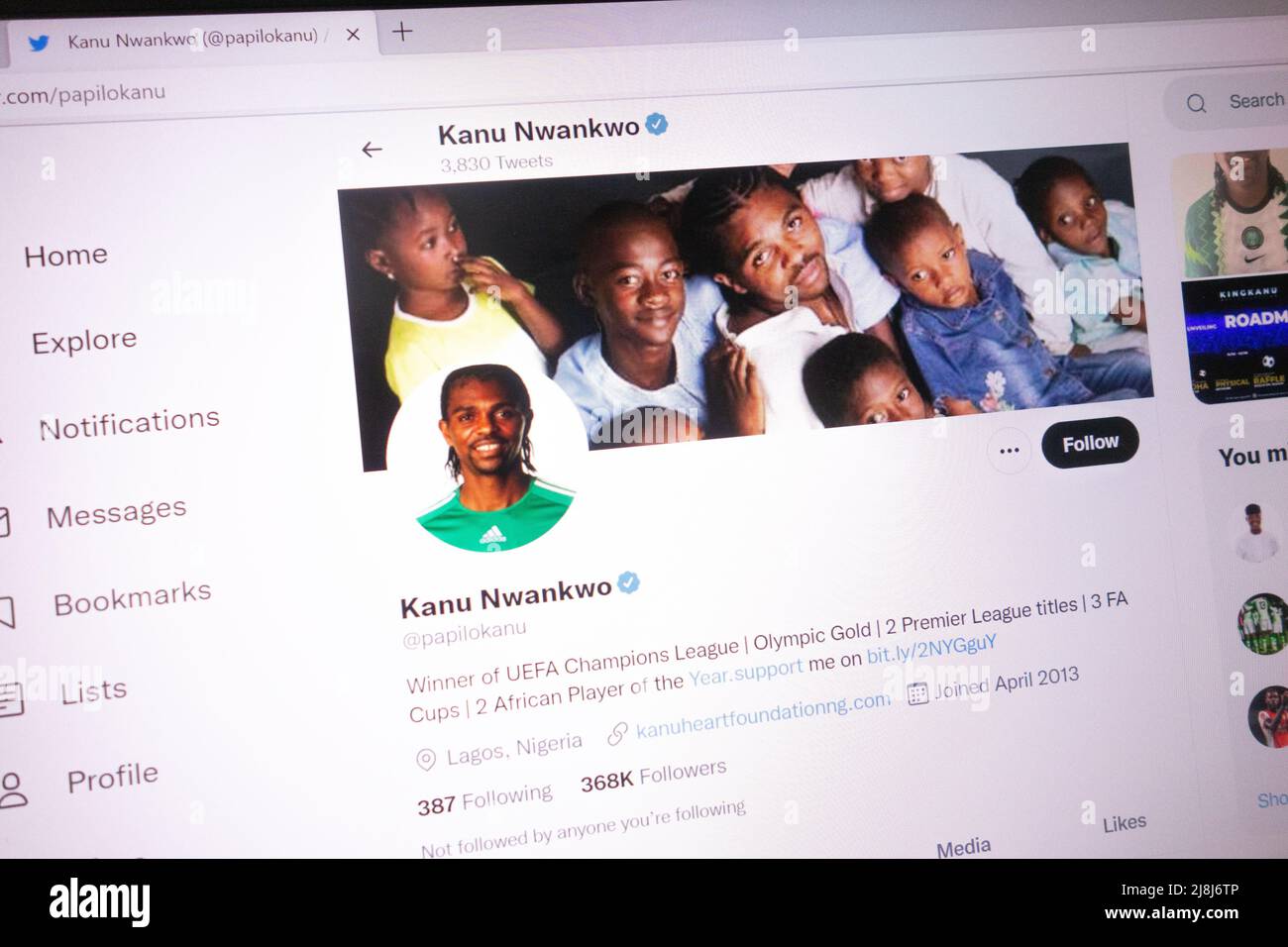 KONSKIE, POLAND - May 14, 2022: Nwankwo Kanu official Twitter account displayed on laptop screen Stock Photo