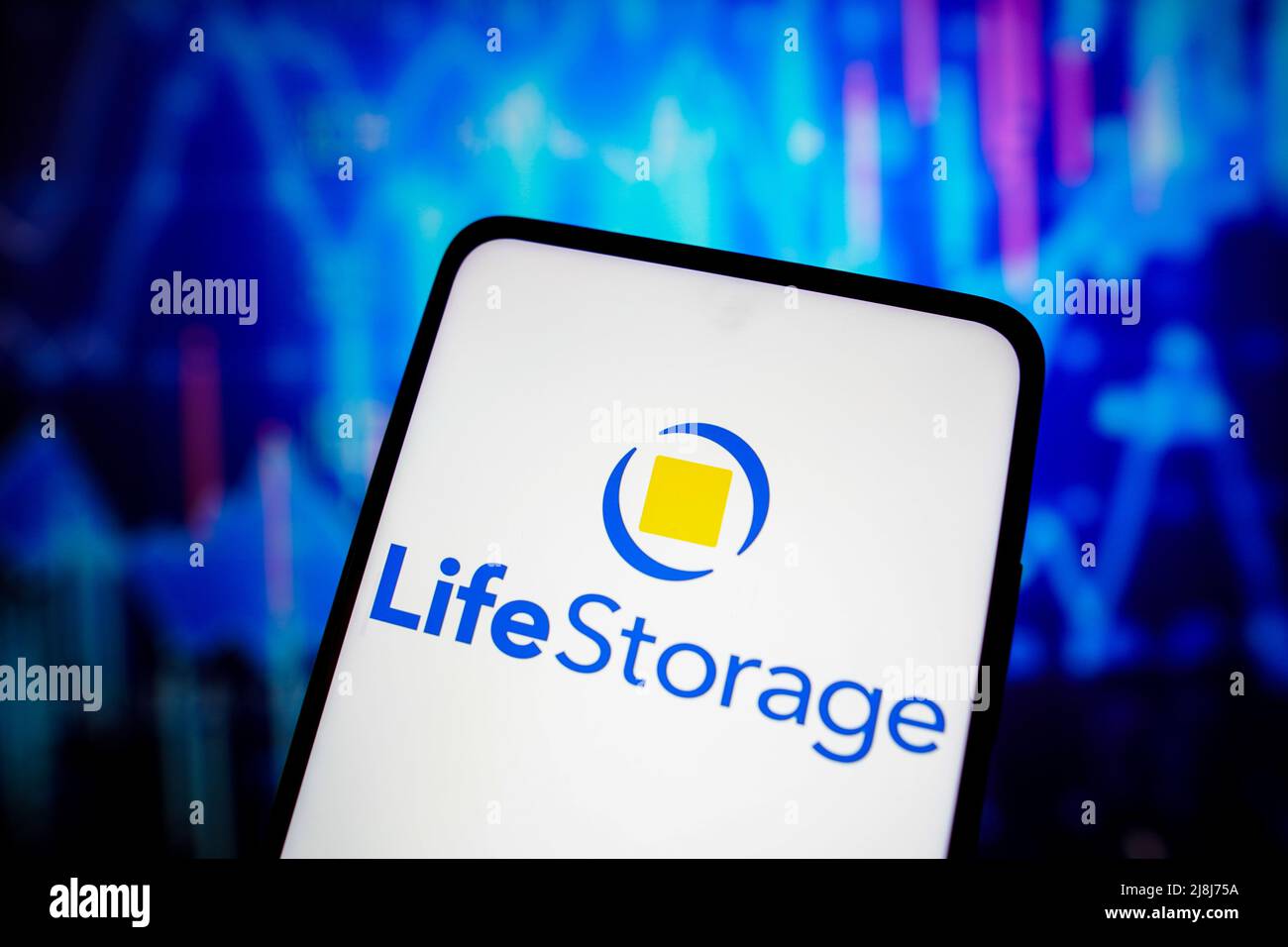 In this photo illustration the Life Storage logo seen displayed on a ...