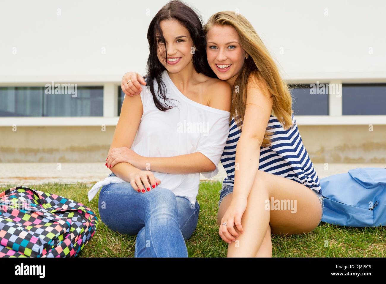 Beautiful and happy teenage students at the school Stock Photo
