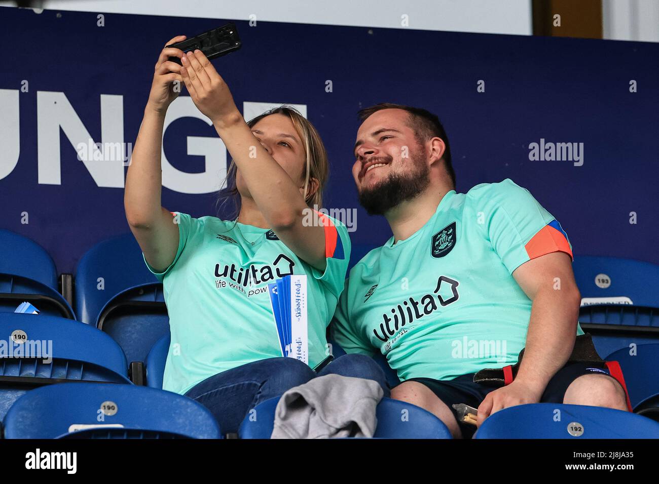 Huddersfield fans arrive for the game Stock Photo Alamy