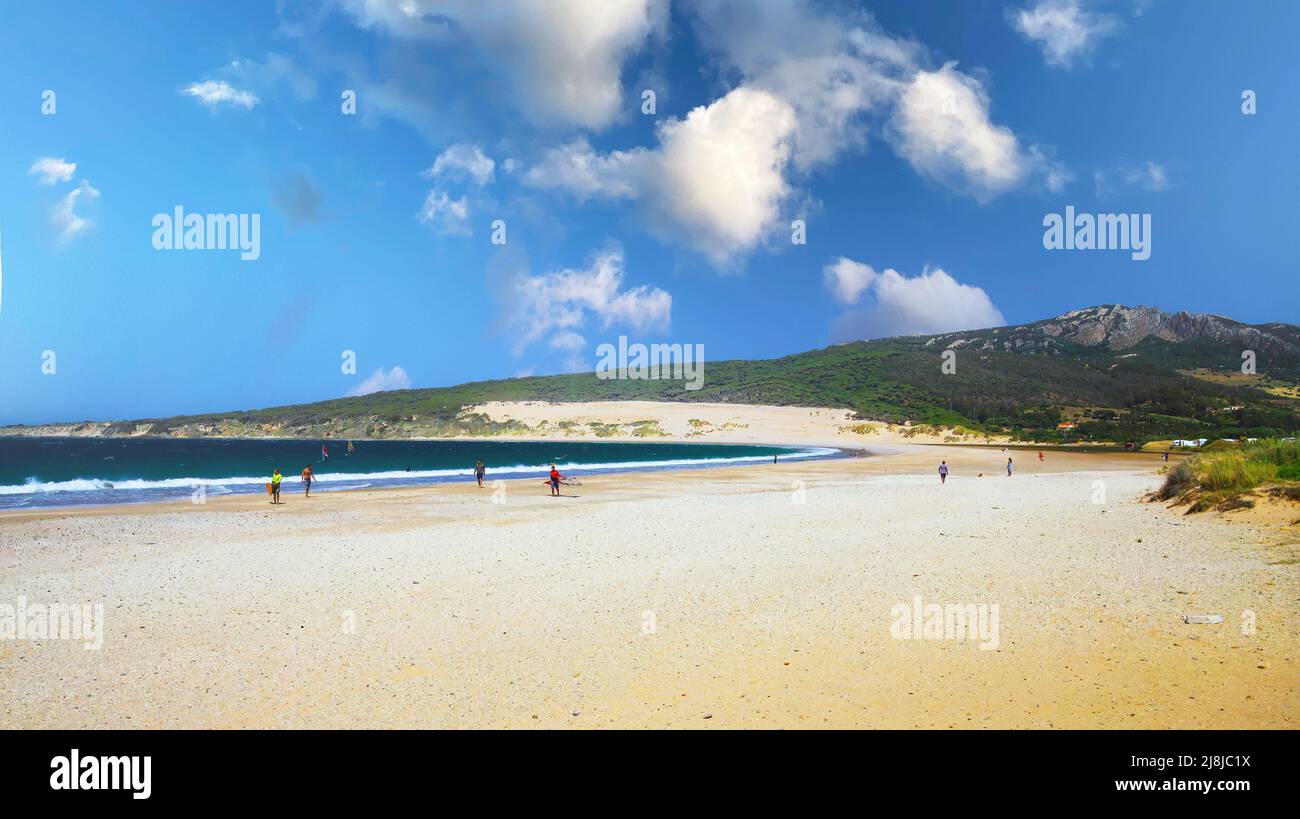 Beautiful spanish  natural beach lagoon landscape, white sand, green hills, turquoise sea ocean - Zahara de los Atunes, Spain Stock Photo