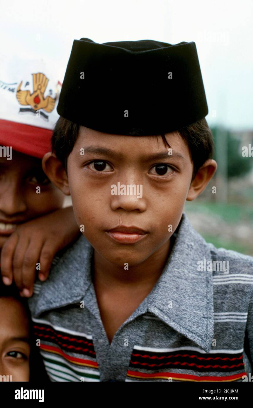 Serious young boy in Surabaya on Java island in Indonesia 1985 Stock ...