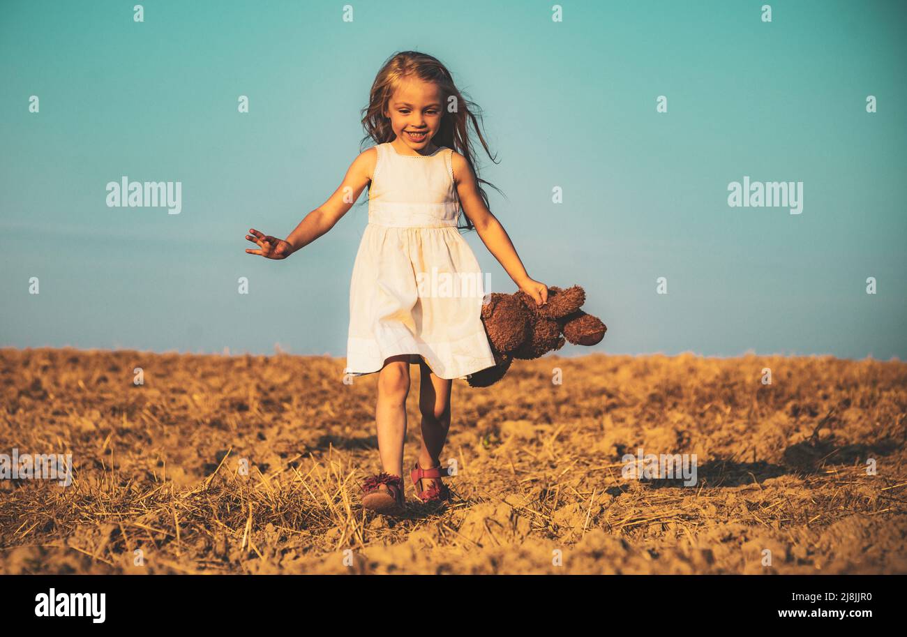 Adorable kid having fun. Cute young girl. Little child have fun on