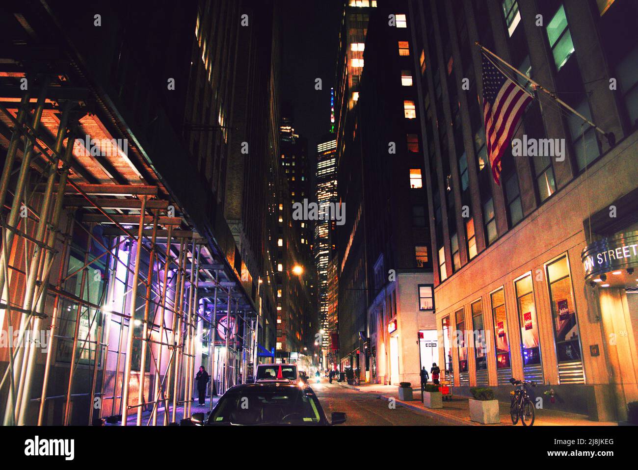 New York City Scape at night along with views of the Empire State Building, the Brooklyn Bridge and Manhattan One Building Stock Photo