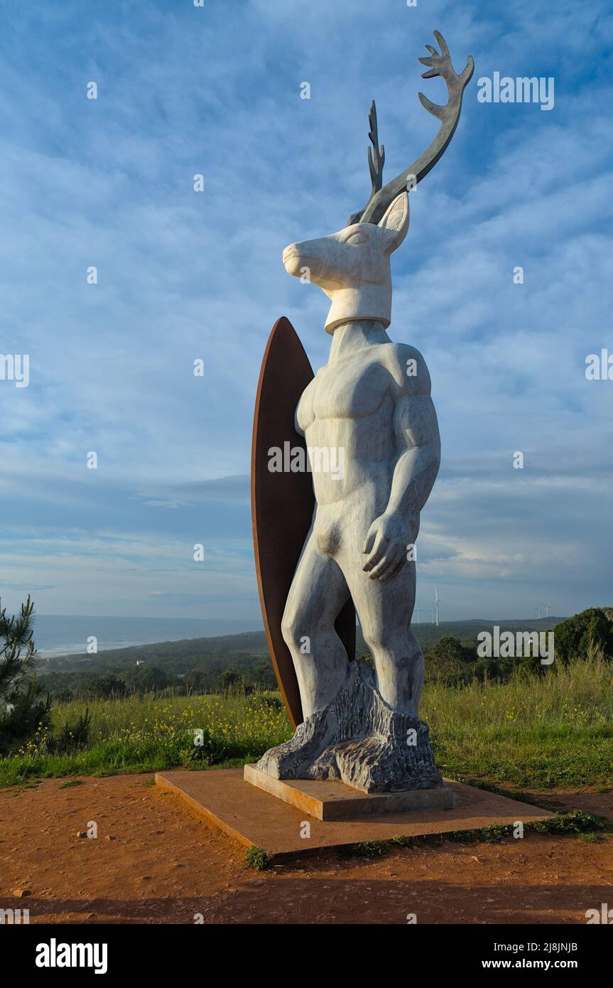 The Surfer Deer Statue in Nazare. Place of the World Guinness Record of the biggest wave ever surfed Stock Photo