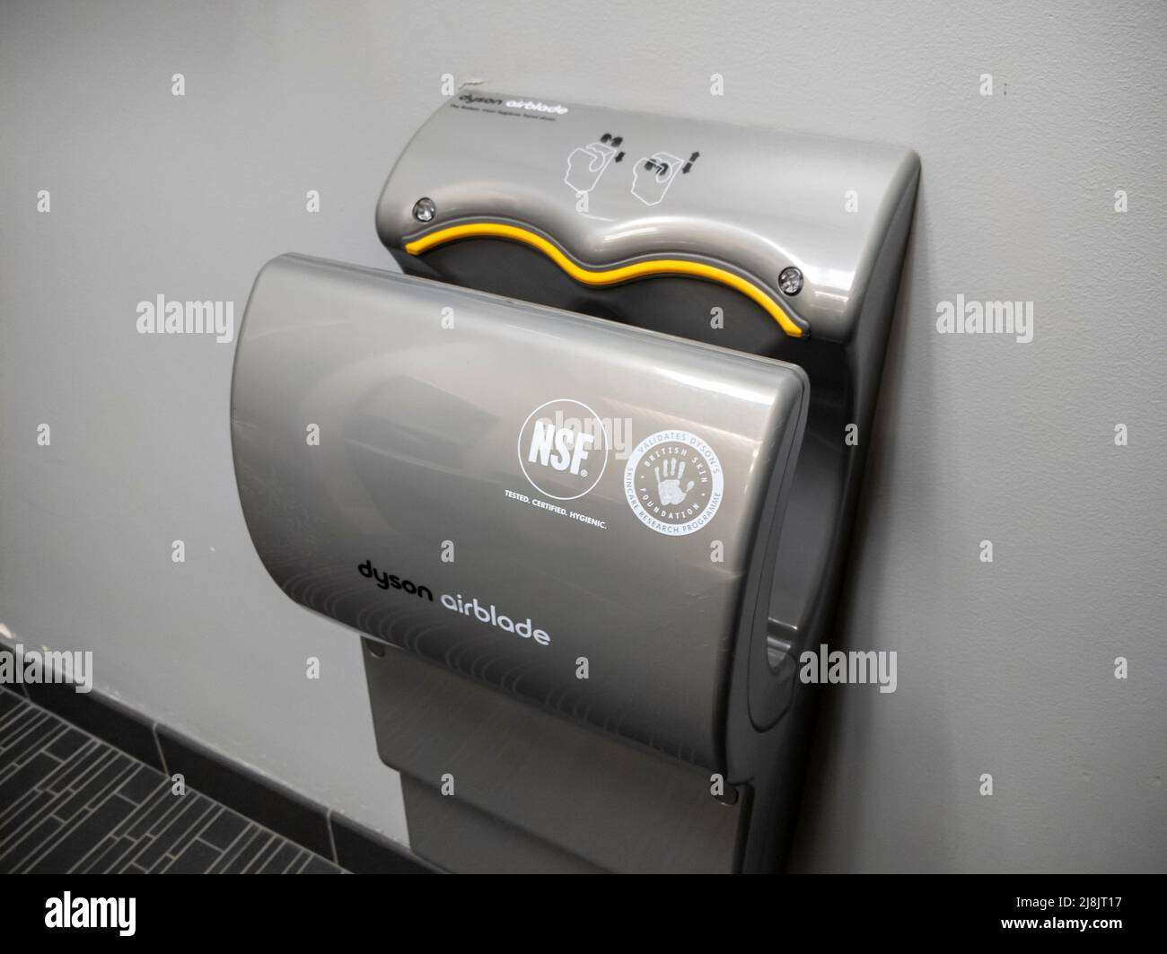 Seattle, WA USA - circa April 2022: Angled view of a Dyson Airblade hand dryer inside a public restroom Stock Photo