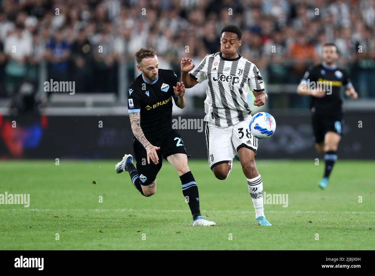 Turin, Italy. May, 16 2022, Marley Ake of Juventus Fc  and Manuel Lazzari of Ss Lazio battle for the ball during the Serie A match between Juventus Fc and Ss Lazio at Allianz Stadium on May, 16 2022 in Turin, Italy. Stock Photo