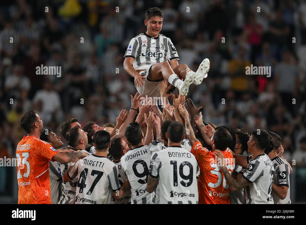 Milan, Italy, 15th May 2022. Paulo Dybala of Juventus is launched into the air by team mates as they give him a fitting send of in his final home game for the club after the Serie A match at Giuseppe Meazza, Milan. Picture credit should read: Jonathan Moscrop / Sportimage Stock Photo
