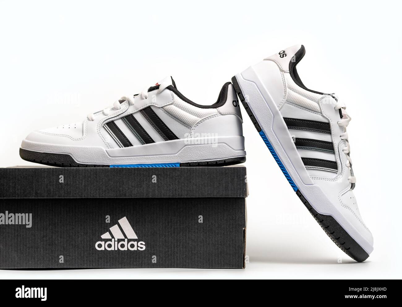 Belgrade, Serbia - May 11, 2022. New Adidas tennis shoes on white background with package box. New Adidas Sneakers or trainers on white background. Me Stock Photo