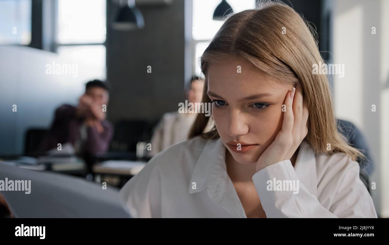 Sad girl sitting alone in classroom hi-res stock photography and images ...