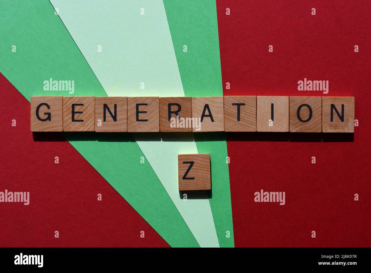 Generation Z, people born between 1995 and 2010, words in wooden alphabet letters isolated on colour background Stock Photo