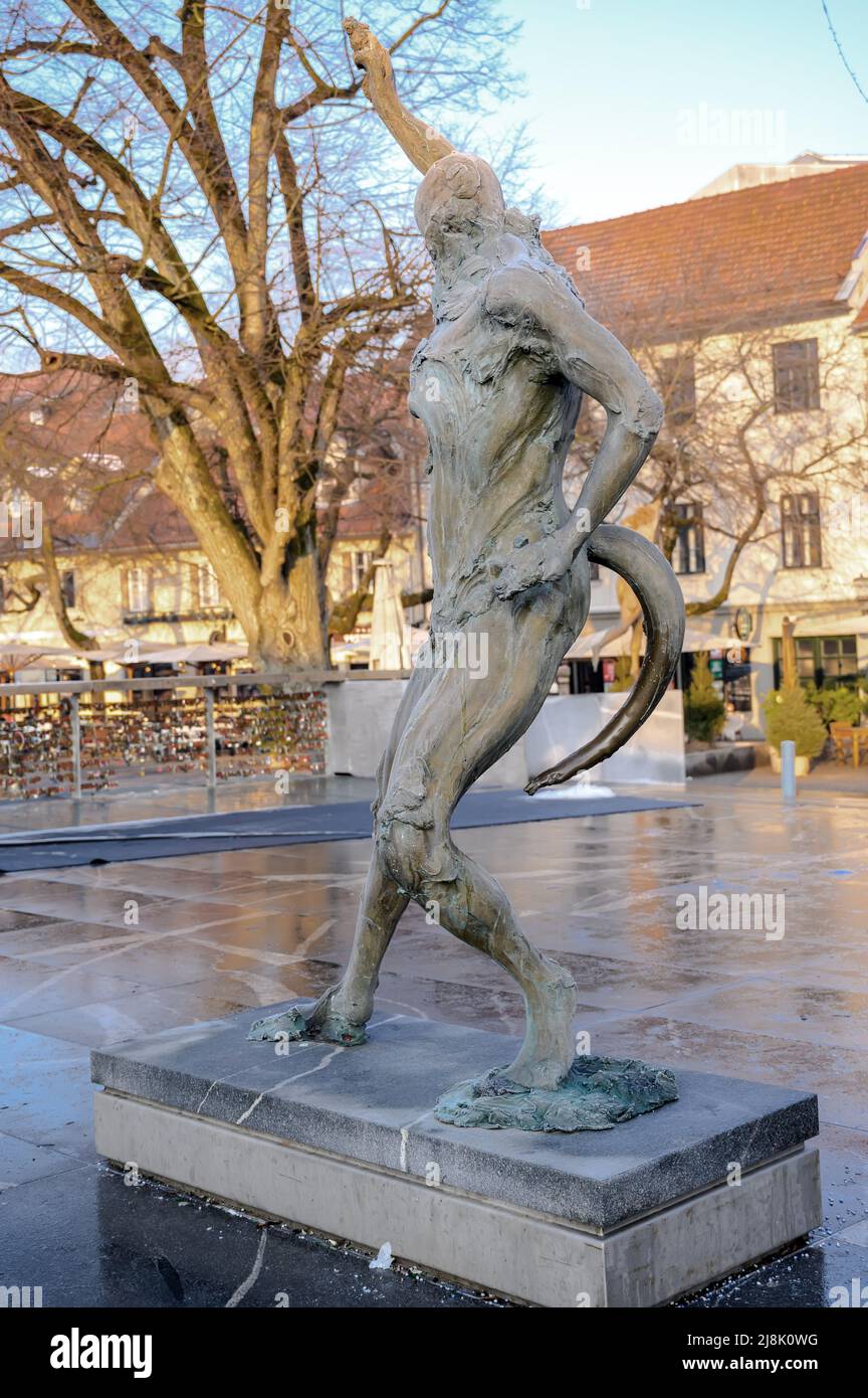 LJUBLJANA, SLOVENIA - FEBRUARY 15, 2022: Modern statue of a body by Jakov Brdar near Butchers’ Bridge in Ljubljana Stock Photo