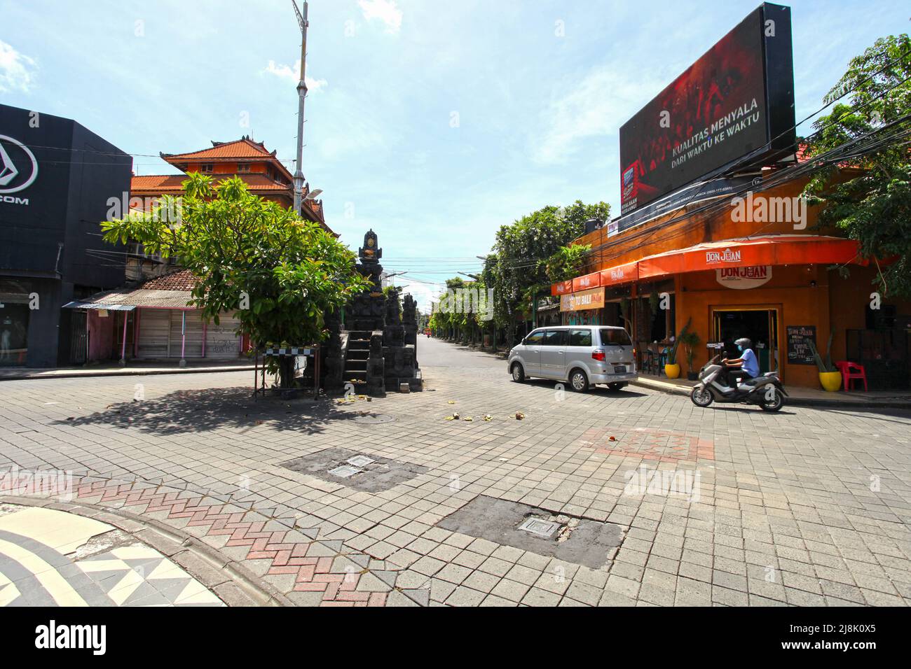 View of Bemo Corner where Legian Street and Jalan Pantai Kuta meet in downtown Kuta, Bali, Indonesia with no tourists around during the pandemic. Stock Photo