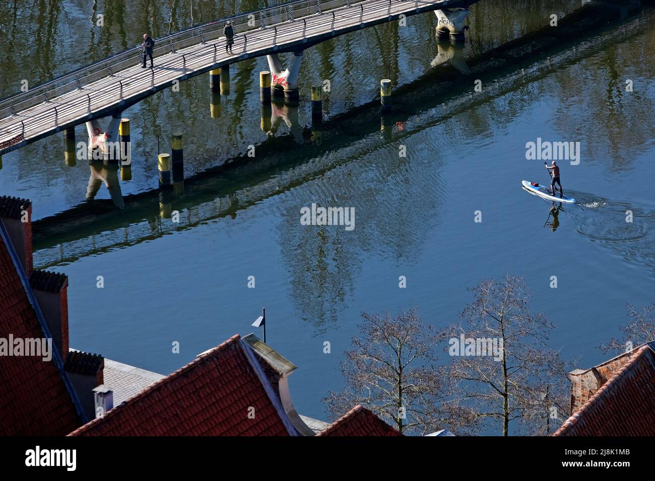 Stand-up paddler on river Trave from bird's eye view, Germany, Schleswig-Holstein, Luebeck Stock Photo
