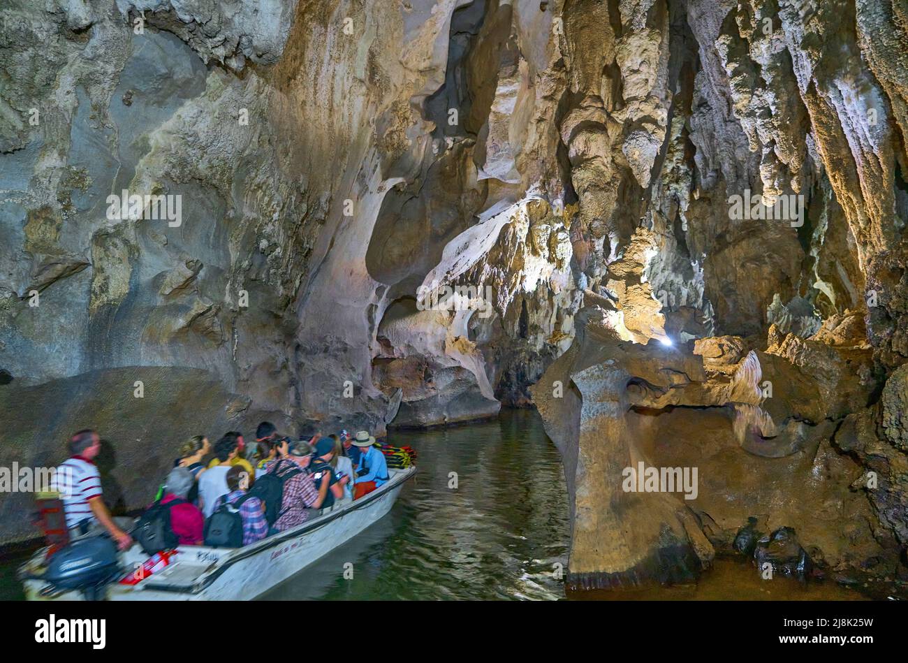 Visitors in a boat in the karst cave Cueva del Indio, Cuba, Pinar del Rio, Vinales Stock Photo