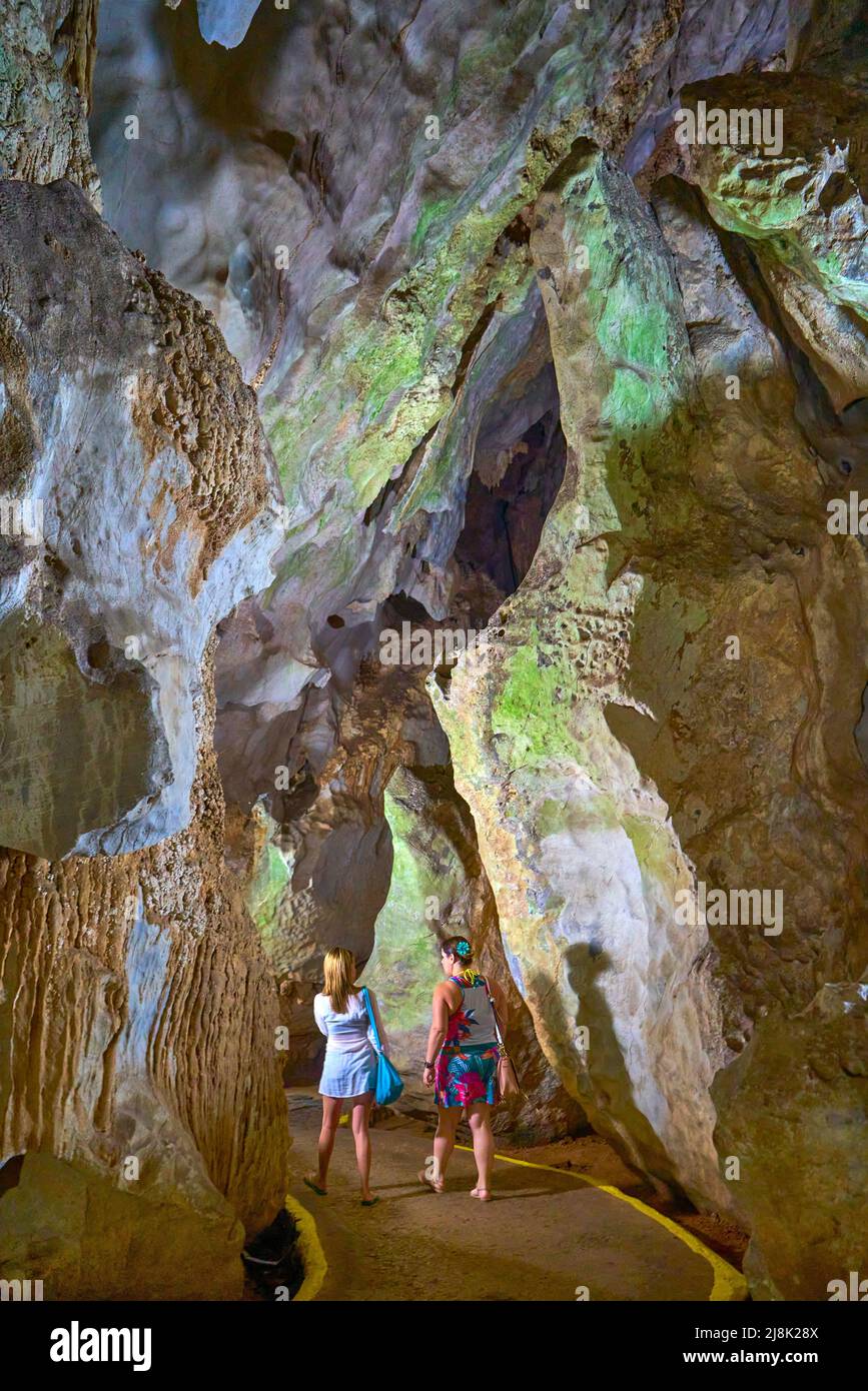 Tourists visit the karst cave Cueva del Indio, Cuba, Pinar del Rio, Vinales Stock Photo