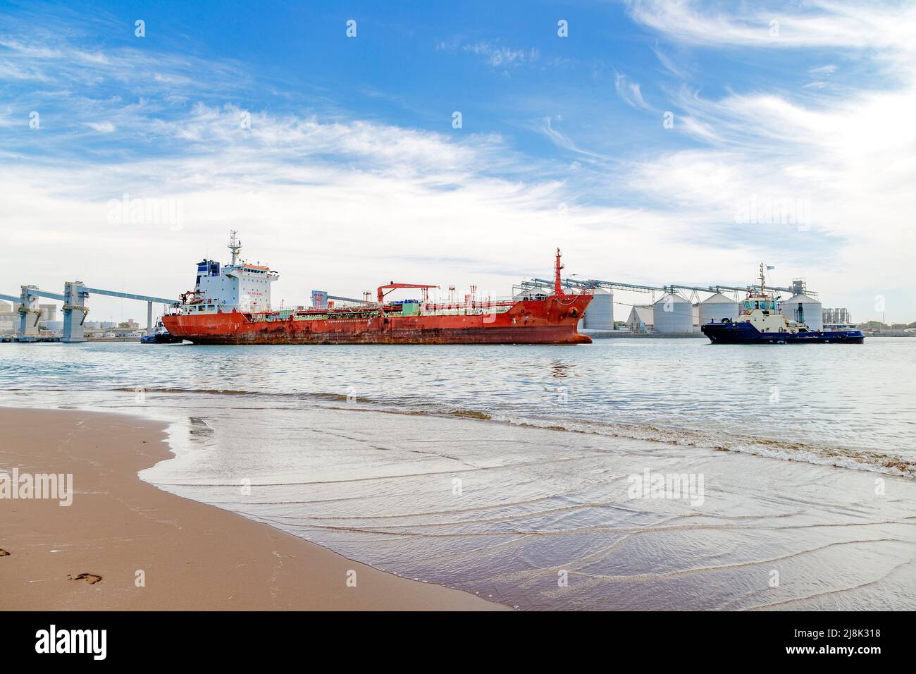 Grain Bulk carrier entering the Port of Necochea in Argentina. Stock Photo