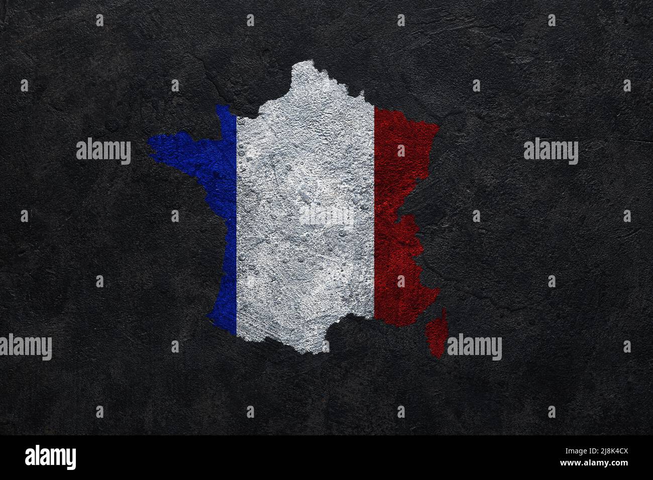 Painted map of France in colors of national flag on dark grunge ...