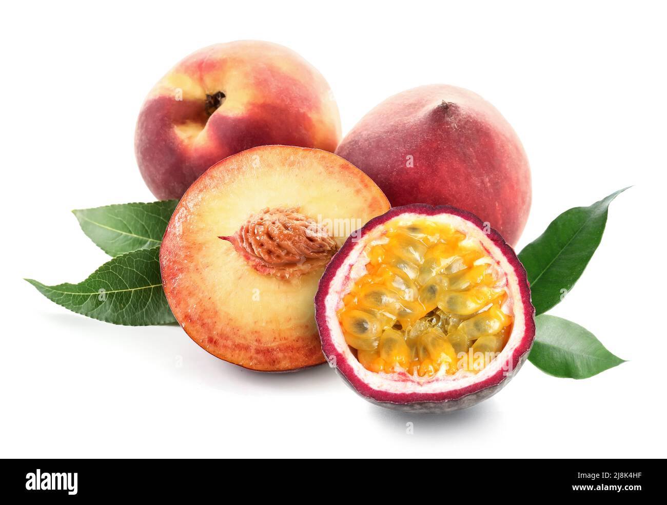 Ripe passion fruit and peach on white background Stock Photo